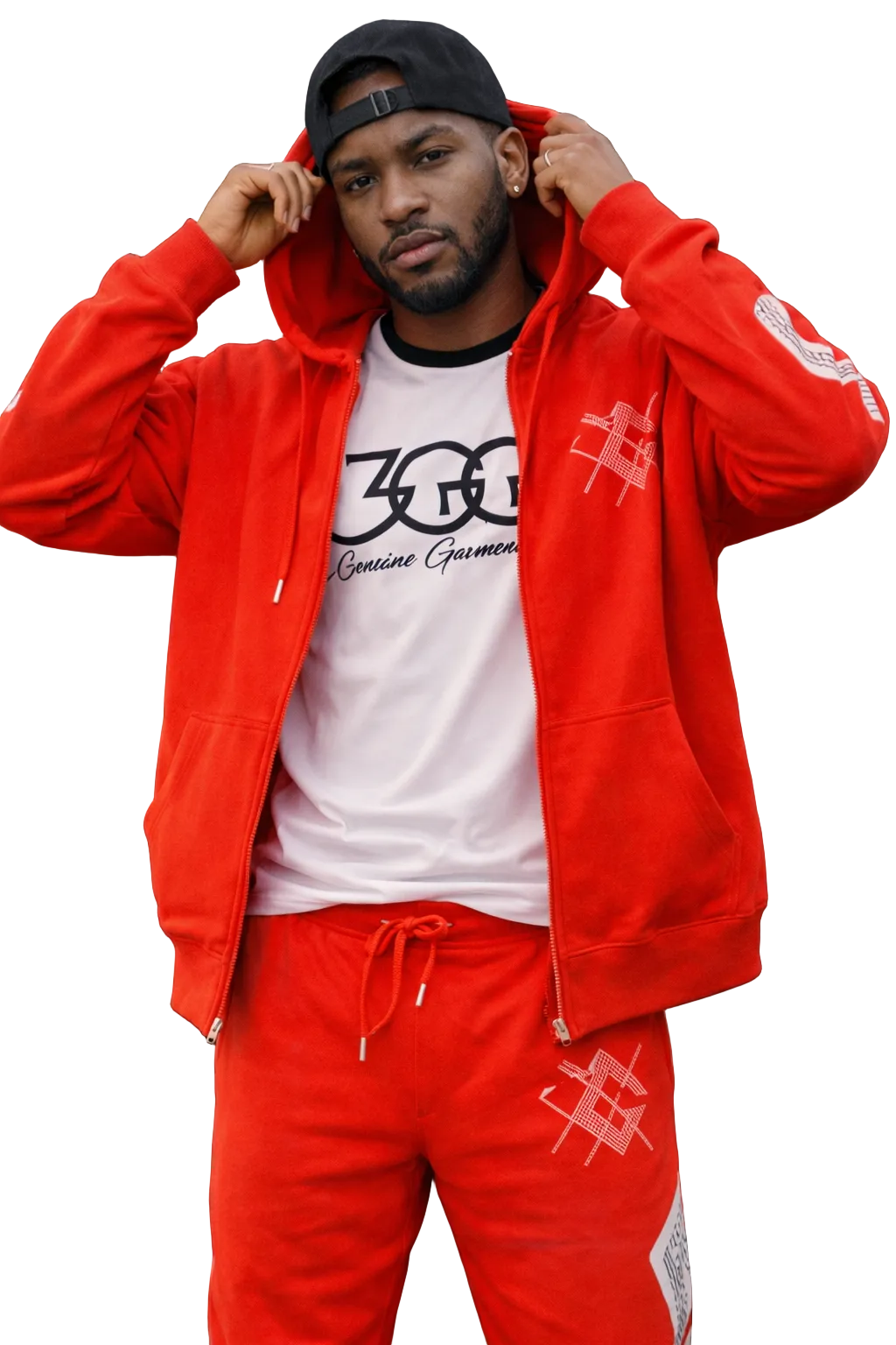 Person wearing a red tracksuit with black graphics on a white background
